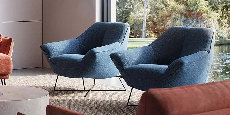 The Rico Queen chair from ROM is a firm favourite, with its inviting design and comfortable sit. The ribbon piping detail helps define the look and it is a chair that complements any of the ROM sofas.
Rico comes in a choice of bases, not just the metal cross base pictured; there is the option for wooden legs or even a swivel base. Available in a wide range of fabrics or leathers, you can also choose a two-tone combination, and add contrast stitching - the sky is almost the limit with ROM!
