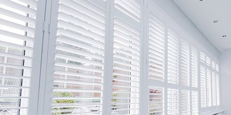 There is a wide variety of styles available, the classic being the traditional PLANTATION SHUTTERS. These were originally found on large plantation houses in the North American Deep South. This type of shutter gives excellent light and air control, as well as looking extremely smart.
TIER ON TIER and CAFE style shutters are also popular, and are incredibly versatile, enabling you to control levels of light and privacy.
The ultimate in privacy and offering unrivalled insulation and black-out properties are SOLID shutters, constructed from solid wood panels.