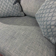 Showroom Clearance: Calliope Cuddler Motion Sofa