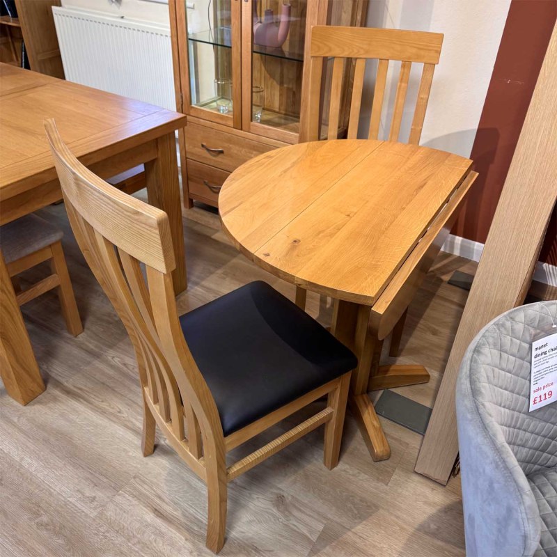 Showroom Clearance: Lynton Oak Round Drop Leaf Dining Table & 2x Slat Back Dining Chairs Showroom Clearance: Lynton Oak Round Drop Leaf Dining Table & 2x Slat Back Dining Chairs