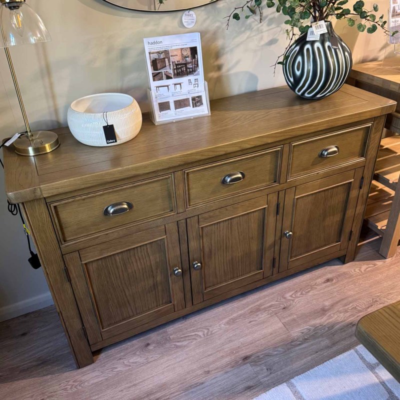 Showroom Clearance: Haddon Oak 3 Door 3 Drawer Sideboard Showroom Clearance: Haddon Oak 3 Door 3 Drawer Sideboard