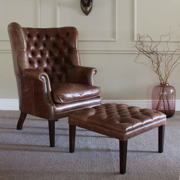 Tetrad Harris Mackenzie Chair in leather shown with Mackenzie Footstool